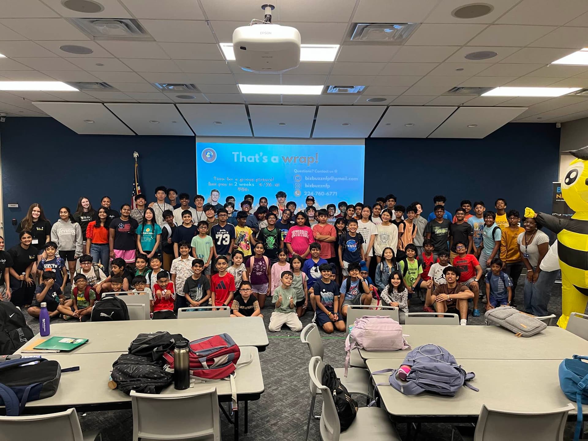 KidPreneur and VentureLab campers together in a large library meeting room