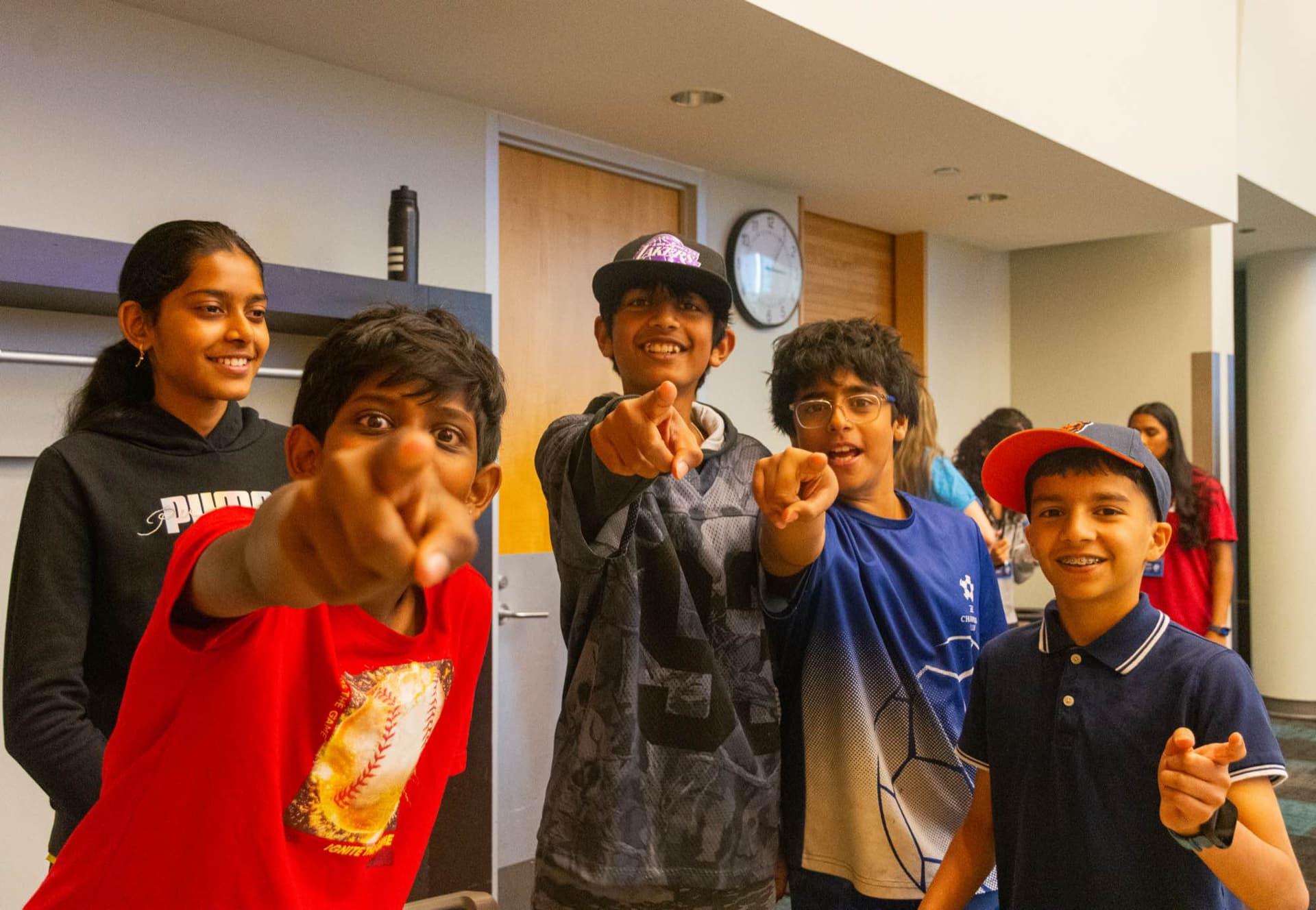 KidPreneur campers pointing at the camera and smiling